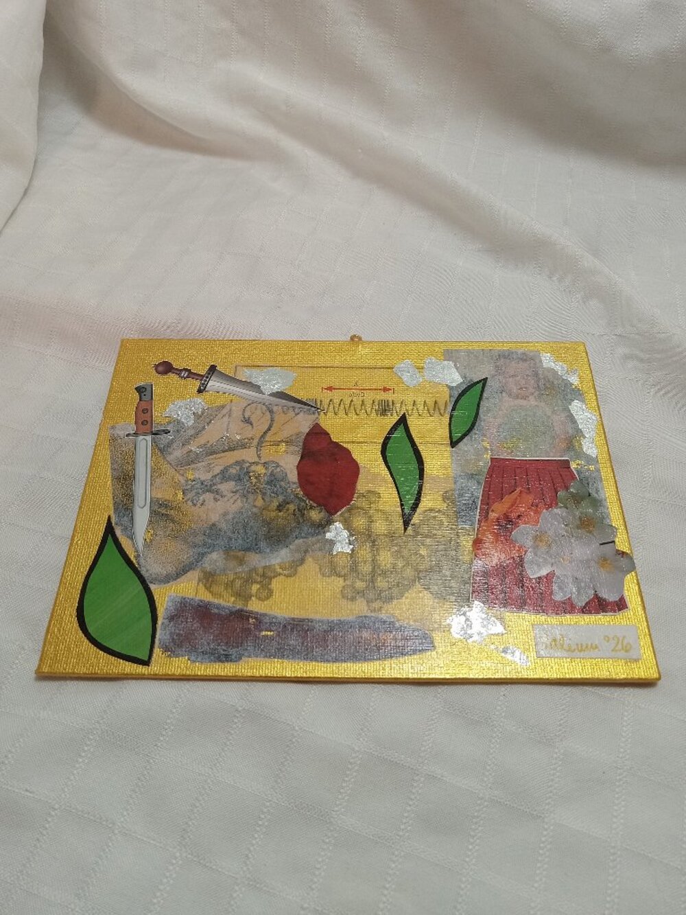 Prints of old magazines on canvas, gold paint, and mixed-media collages